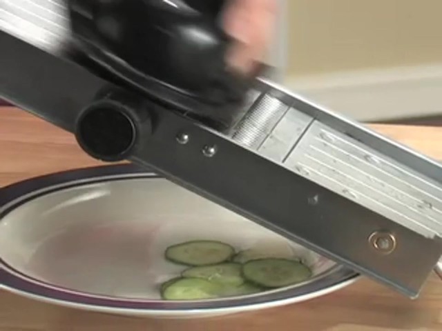 Pro Stainless Steel Mandoline Slicer with Bonus Food Pusher / Receptacle - image 7 from the video